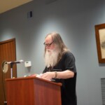 Paul Szlosek reads at the Rain Poets Reading.
Photo by Robert Steele.